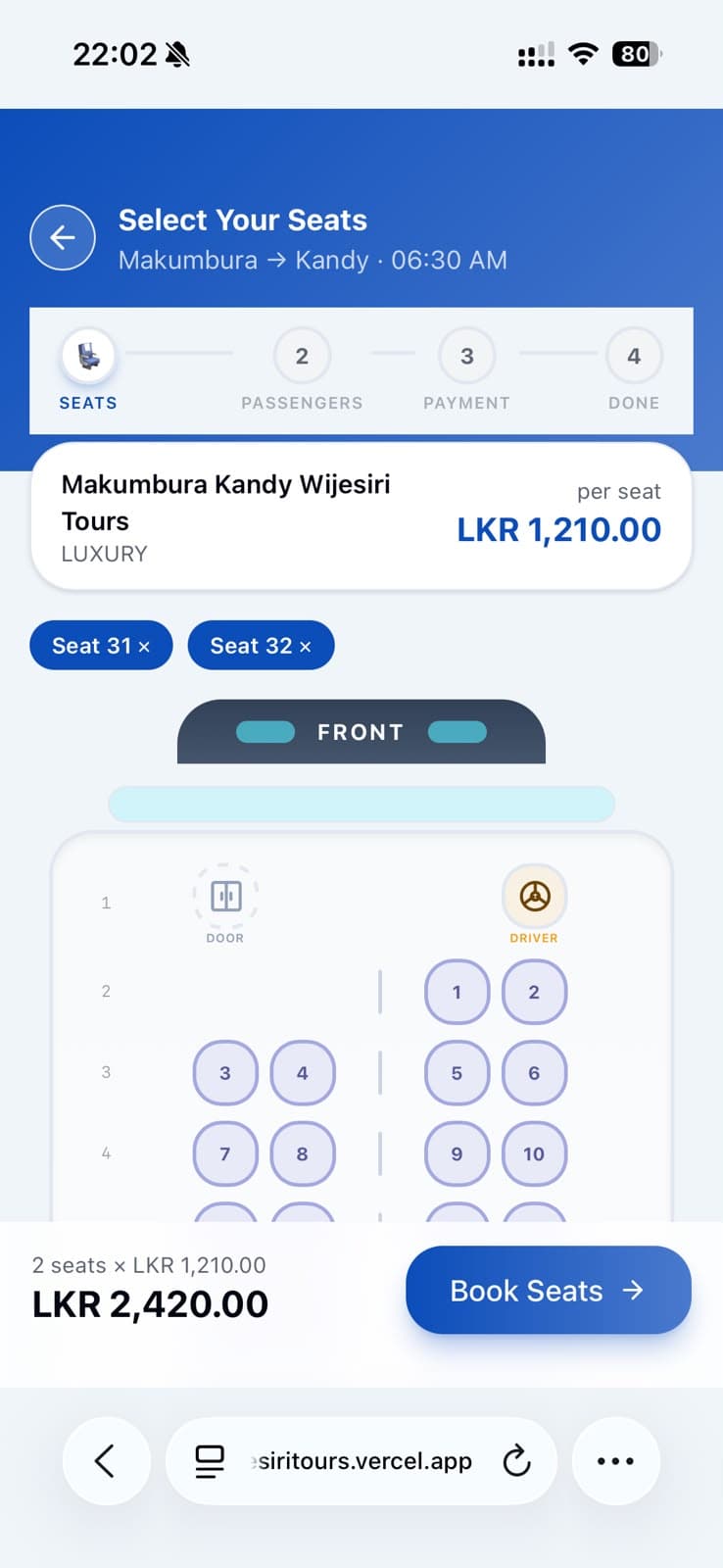 Seat selection screen on mobile for a Makumbura to Kandy service, with two seats selected and the total fare shown